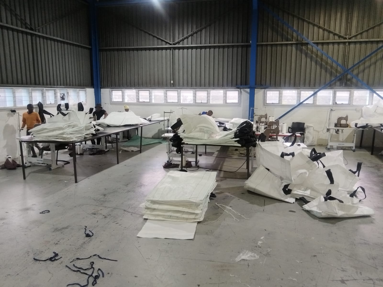 Warehouse stacked with woven polypropylene bulk bags ready for dispatch